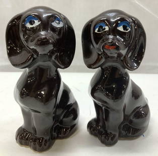 Lot 2+ Vntg Brown Sitting Dog Figurines JAPAN: Lot 2+ Vntg Brown Sitting Dog Figurines JAPAN Pair of brown figurines, figurines are in a seated position & have a brown glossy finish with blue & white eyes. Appears to be Japanese figurines. Surface