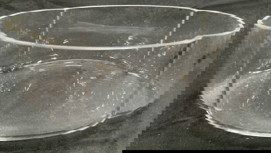 Tabletop Art Glass Vessel Bowl Centerpiece: Vessel is glass. Piece has raised rim. Vessel has unique cloud style form. Tabletop art glass vessel. Piece measures approximately 9.25 inches wide 6.75 inches deep 3 inches tall. Bowl, centerpiece, a