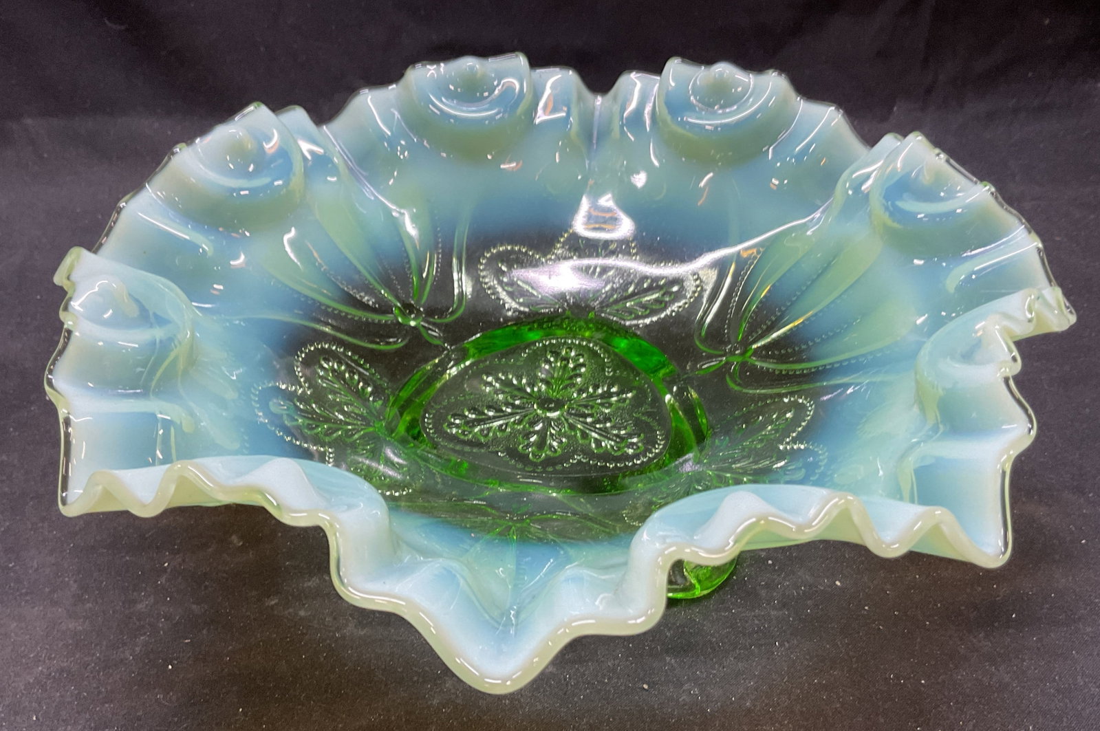 Vtg Jefferson Glass Green Opalescent Footed Bowl: Vintage Jefferson glass green opalescent footed bowl. Beaded drapes, gobble crimped edge. 9.5 x 3.5 inches. Some surface wear consistent with age. Jefferson Glass, opalescent bowl, footed bowl, glass 