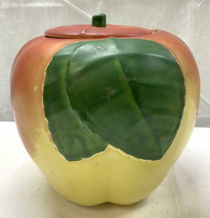 Vintage Blushing Apple Ceramic Cookie Jar: Vintage Blushing Apple Ceramic Cookie Jar Cookie jar in the shape of an apple featuring a distinct blushing effect. Jar has a green leaves & the stem on the lid. Surface wear consistent to age, use &
