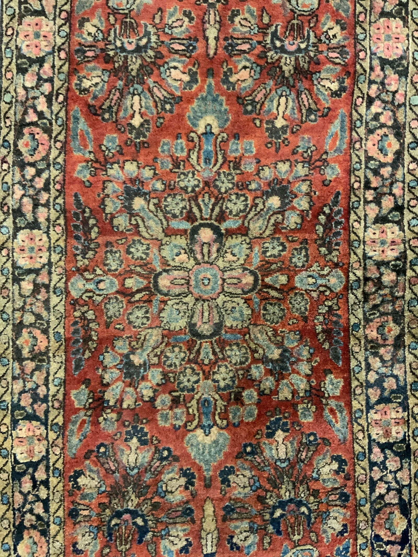 Antique Handmade Persian Wool Area Rug: Rug is handmade and wool. Piece appears to be Persian. Rug appears to be antique possibly vintage. Piece has intricate multi toned floral motif detail. Rug measures approximately 49 inches long 24 inc