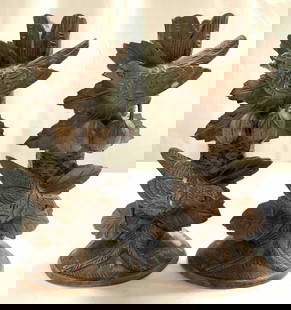 HARVEST GOODS Pr Crvd Resin Candlesticks: Tags on undersides read HARVEST GOODS. Lot includes 2 candlesticks. Each are brown toned and appear to be resin. Candlesticks each have intricate bird, leaf & stump detail. Candlesticks each measure a