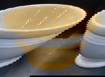 Antique Yellowware Banded Pottery Mixing Bowl: Antique Yellowware pottery mixing bowl. Hand painted, white banded design. Measures approx 9 x 4.5 inches. Some scratching and crazing observed. Yellowware, Yellowware bowl, Yellowware mixing bowl, an