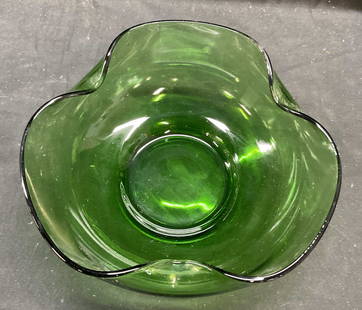 Vintage Heavy Green Art Glass Serving Bowl: Vintage emerald green art glass serving bowl with curved rim design. Thick walled glass, piece is heavy. Style of Anchor Hocking, unmarked. Measures approx 9.5 x 4 inches. Some scratching observed. Ar