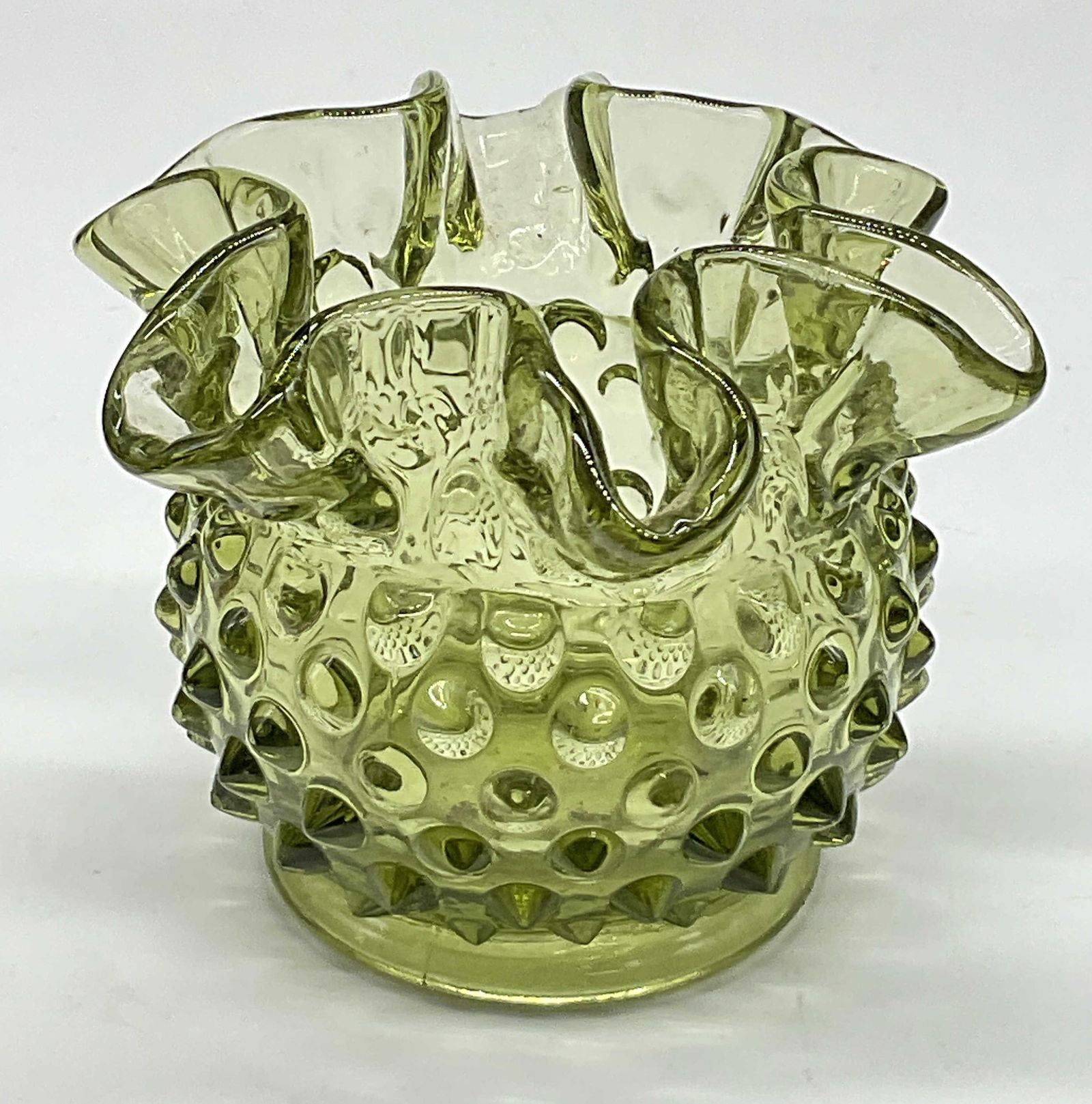 Vintage Ruffle Rim Green Hobnail Glass Vase/Vessel: Vintage Ruffle Rim Green Hobnail Glass Vase / Vessel / Candle Holder. Measures approx. 3H x 4W in. Surface wear and residue present. Glass seam present. home decor, home accents, homewares, housewares