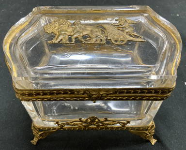 French Napoleon 3 Regncy Empire Ormol Cryst Jwl Bx: French Napoleon III Regency Empire Ormolu Brass Crystal Jewelry Box Chest. Piece has 4 winged feet. Jewelry box includes hinged lid. Piece has ornamentation of cherubs pulling lions on a chariot. Piec