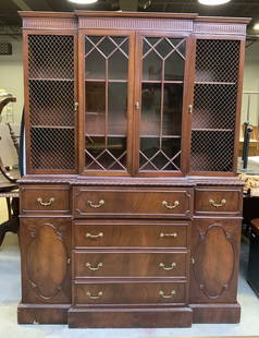 Vintage Wooden Secretary W Display Cabinet: Secretary is vintage. Piece is brown toned and wooden. Upper half has display cabinet with windowed glass doors with Two shelves in each. Lower half has 6 drawers each with brass handles, most with do