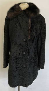 Vtg RMP Black Curly Lamb Wool Fur Coat: Vintage RMP Black curly lamb wool fur coat. Fully lined. 20 inches across chest. Initials RMP sewn into interior. Rhinestone covered buttons. Fur collar, possibly mink. Two front pockets. Some surface