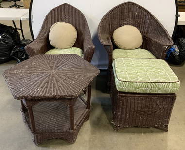 Antq Set 4 Wicker Furniture W Custom Cushions: Lot includes 2 Arm chairs, 1 table, & 1 ottoman. Each piece is brown toned antique woven wicker. Lot also includes custom made green and cream toned patterned cushions & 2 circular form tan pillows. L
