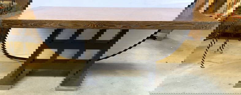 Cust Dining Room Table D&D Building W Leaves: Table has brown toned wooden top, appears to be walnut. Table has custom made metal base with gridded wooden support. Originally property of the D&D building Manhattan New York. Table without leaf ext