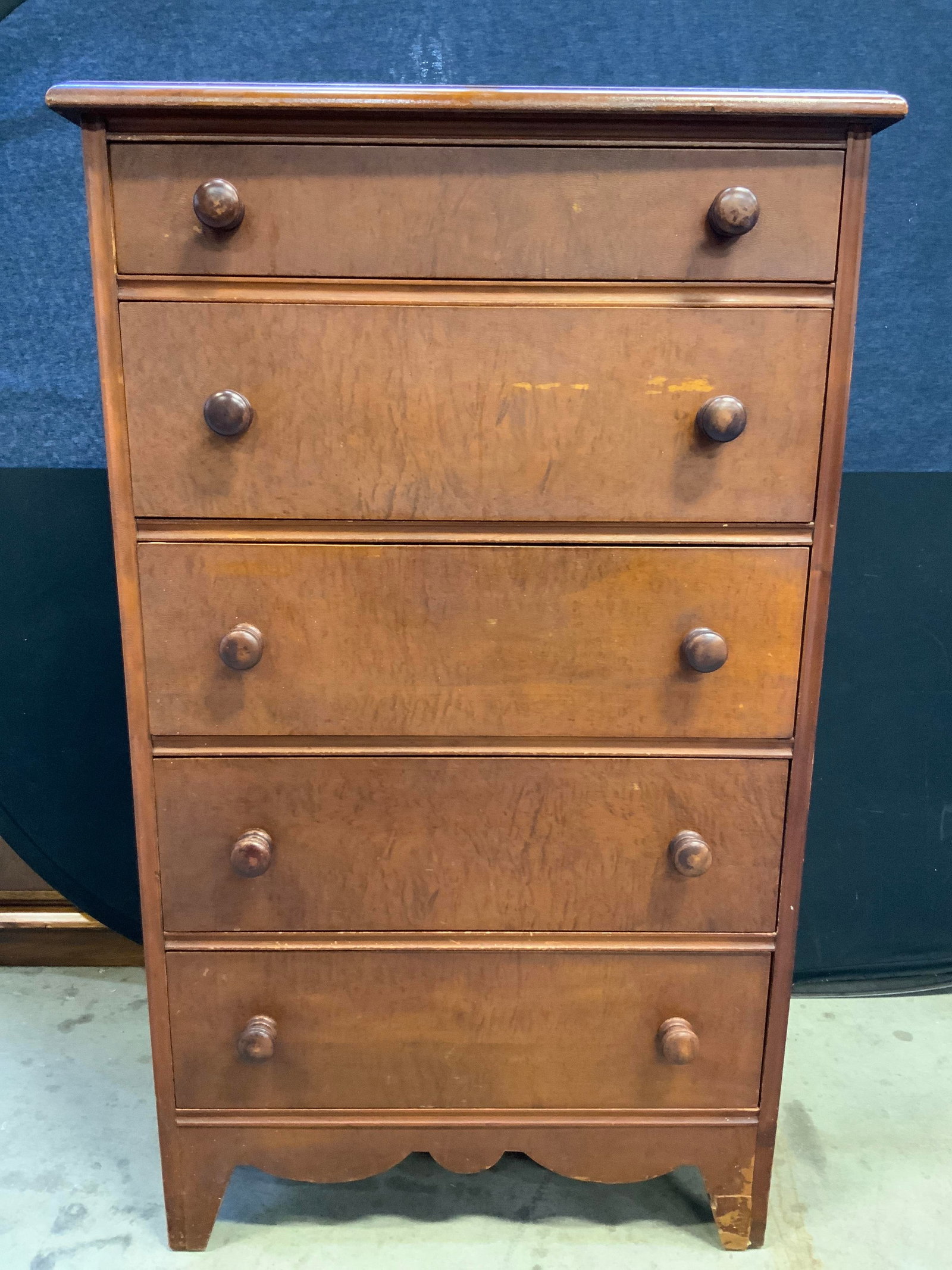 Vintage Wooden 5 Drawer Tallboy Dresser: Tag on backside illegible. Dresser is light brown toned and wooden. Piece has 5 drawers, each with double wooden knobs and hand dovetailing. Piece appears to be vintage. Dresser measures approximately
