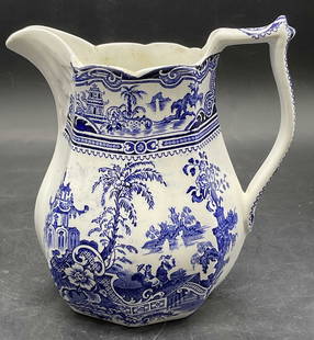 KYBER W. ADAMS & SONS ENGLAND Ceramic Pitcher: KYBER W. ADAMS & SONS ENGLAND Ceramic Pitcher. Blue and white hues to the piece. Chinoiserie elements such as pagodas, Asian figures, boats, and exotic foliage to the piece. Measures approx. 6H x 5.5W