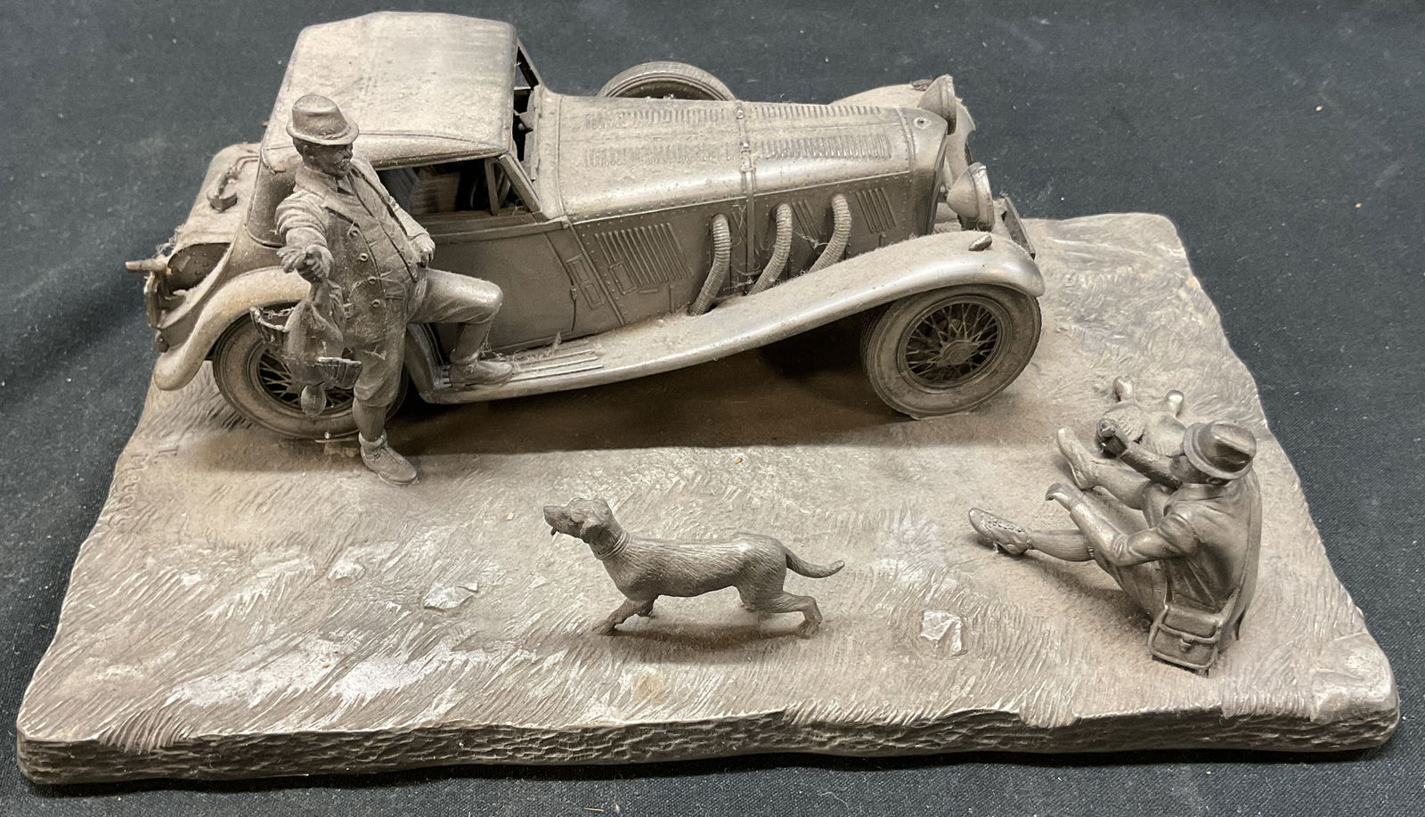 Vtg Fine Pewter Raymond Meyers Mercedes Benz SSK: Vtg fine pewter Raymond Meyers Mercedes Benz SSK. The 1929 Mercedes Benz SSK by Raymond Meyers. Fine pewter, the Franklin mint 1977. Steel metal sculpture. 8 x 5 x 2.5 inches. Signed on underside. Res