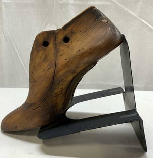 Vntg Cobblers Carved Wood Shoe Mold Bookend: Vntg Cobblers Carved Wood Shoe Mold Bookend Hand-carved solid wood shoe mold that appears to be have been repurposed into a bookend. Shoe mold has carvings that appears to read 3 1/2. Surface wear con