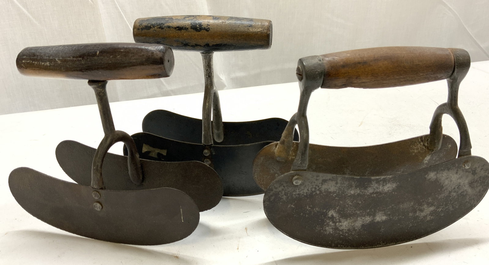 Lot 3+ Antq Metal Double Blade Copping Tools: Lot 3+ Antq Metal Double Blade Copping Tools Tools feature 2 curved blade & a wooden handle. No visible signature or markings. Surface wear consistent to age, use & exposure. Measurements: length 6in 
