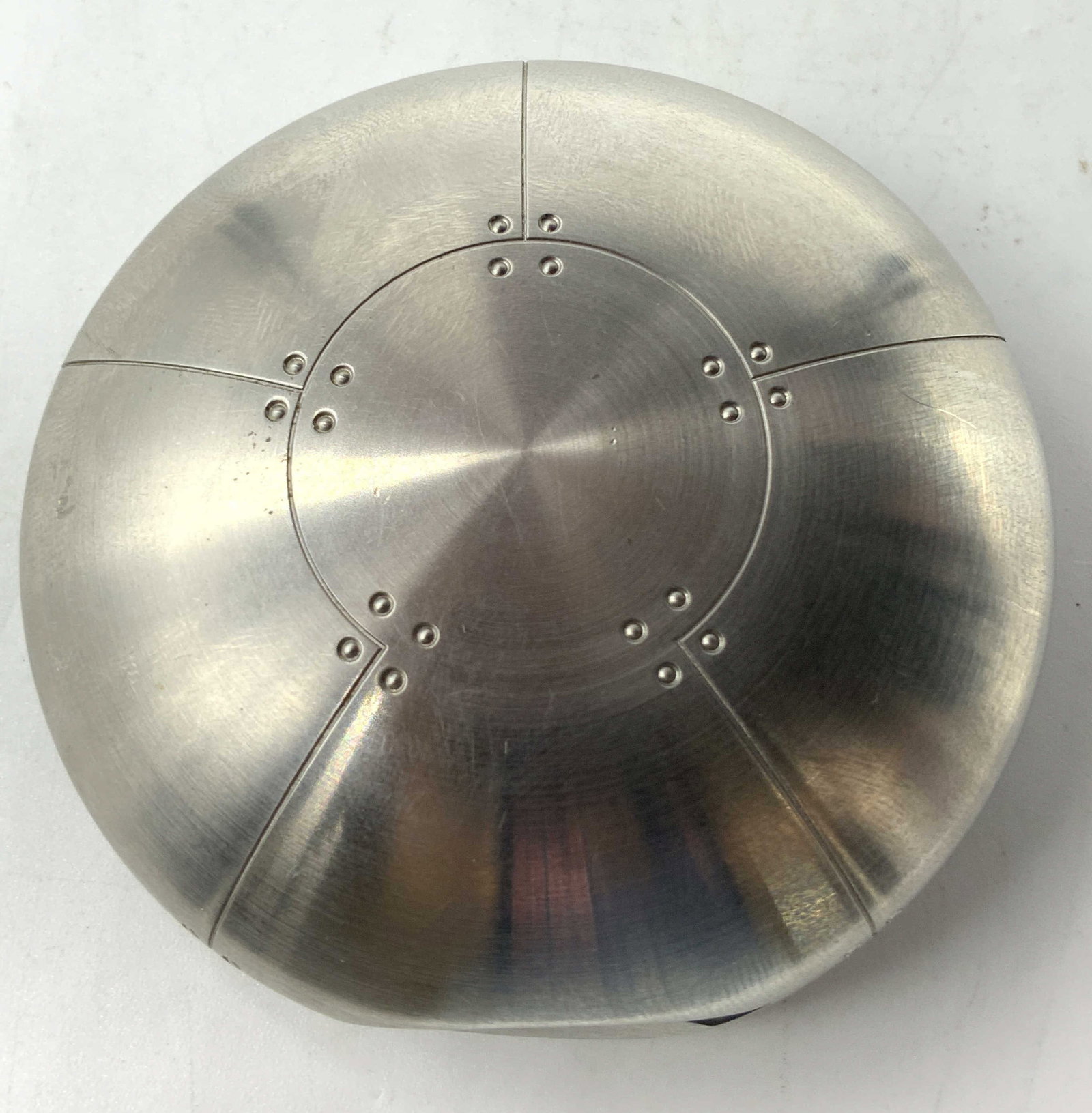 TIFFANY&CO. Streamerica Perisphere Trinket Pillbox: TIFFANY&CO. Stainless Steel Trinket Pillbox Round stainless steel trinket pillbox. Can be possibly used as trinket box, pill box or even as a paperweight. Reads TIFFANY & CO. on underside. Signed & ma