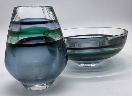 Set 2 ORREFORS Vintage Banded Crystal Bowl & Vase: Set of 2 ORREFORS Vintage Banded Crystal Bowl & Vase. Clear, green, blue, and black hues throughout. Thick walled and weighty. Vase measures approx. 5.5H x 4W in. Measured at widest point. Undersides
