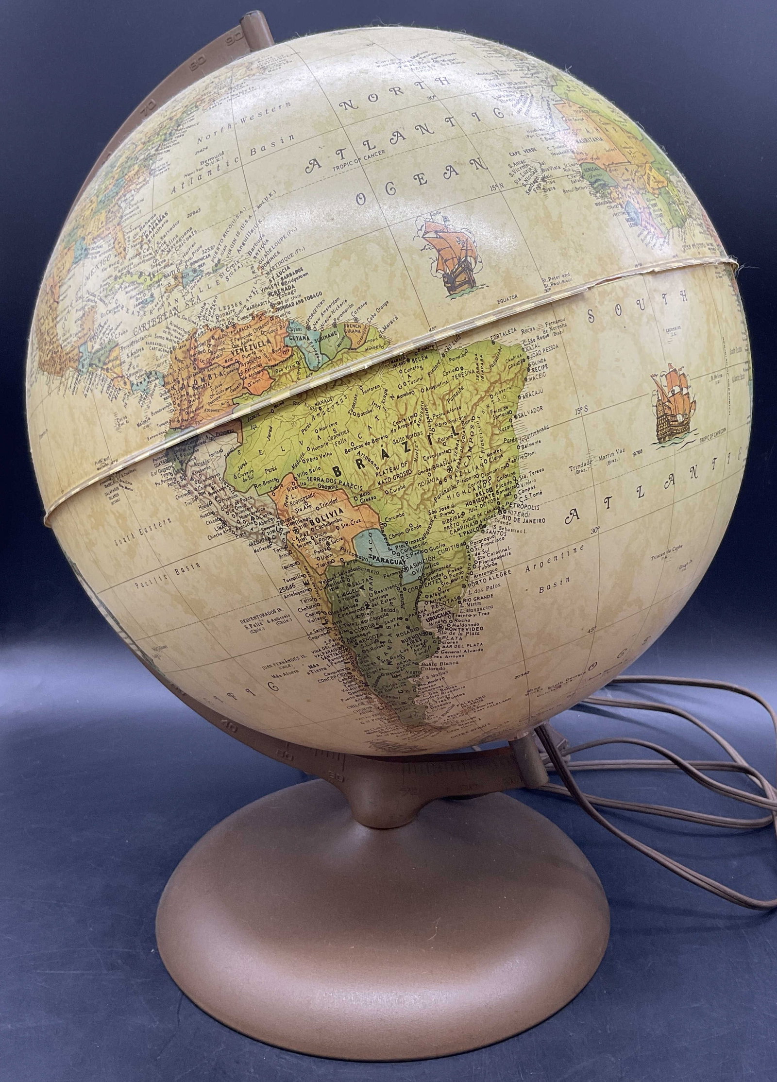 1985 RAND MC NALLY Vintage Portable Globe Lamp: Vintage Portable Globe Lamp. Side reads RAND MC NALLY AND COMPANY HERITAGE COLLECTION, 1985 RMCN. Crafted from metal, composite, and paper materials. Corded. Underside sticker reads Portable Lamp. Not