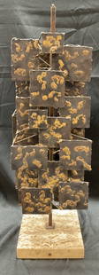 Abstract Metal Multi Plate Sculpture 23in: After Harry Bertoia. No apparent signatures. Abstract metal multi plate sculpture. Multi plated metal brutalist sculpture. 23 x 7 x 6.5 inches. Some surface wear consistent with exposure. metal sculpt