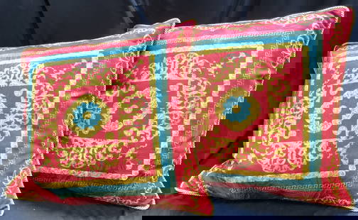 GIANNI VERSACE Pair Corded Edge Pillows: Pillows appear to be GIANNI VERSACE (no apparent tags). Each pillow has red, gold and red tones. Pillows each have ornate scroll and geometric detail. Each pillow has gold toned corded edges. Pillows