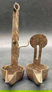 Antique Cast Iron Betty Lamp / Cruise Lamp: Antique Cast Iron Betty Lamp / Cruise Lamp. Betty lamps were oil burning lamps commonly used in the 18th and 19th centuries. These lamps typically burned animal fats, such as lard, or various oils lik