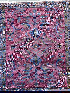Antique Persian Handmade Wool Area Rug: Rug is antique. Piece has intricate multi toned floral motif detail. Rug has cranberry base tone. Piece is handmade and wool. Rug has short cream toned fringes. Rug measures approximately 55 inches lo