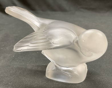 Lalique Moineau Coquet Bird Glass Figurine France: Lalique Moineau Coquet bird glass figurine. Made in France. French Crystal art glass sculpture of a sparrow. Signed on underside. 4.5 x 3 x 3 inches. Some surface wear consistent with exposure, Slight