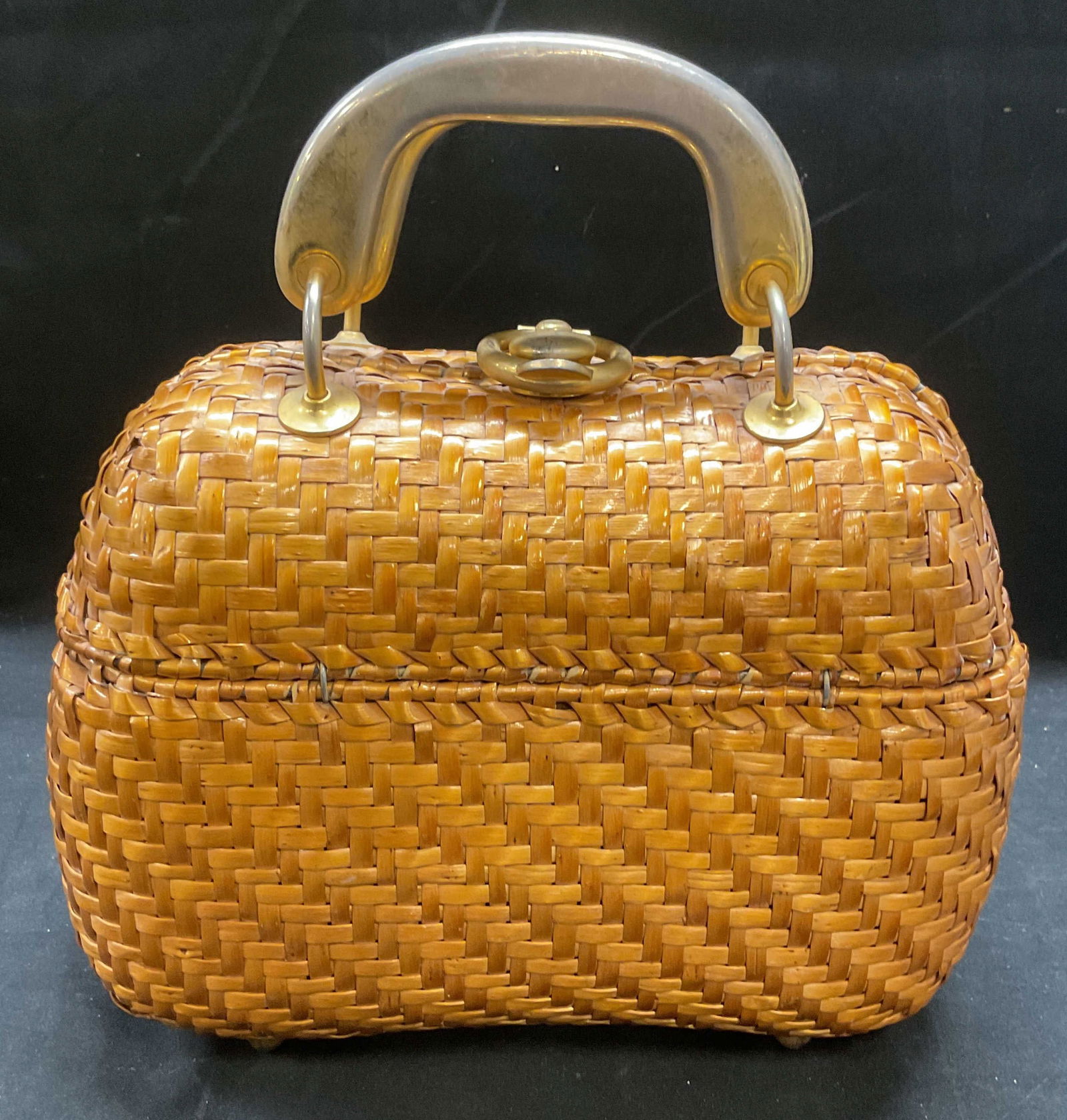 Vintage RODO Woven Wicker Handbag: Vintage RODO woven wicket handbag. Faux leather lining. Gold tone hardware and handles. Measures approx 8.5 x 3.5 x 7 inches. Some wear consistent with exposure, loss to metal finish. RODO handbag, de