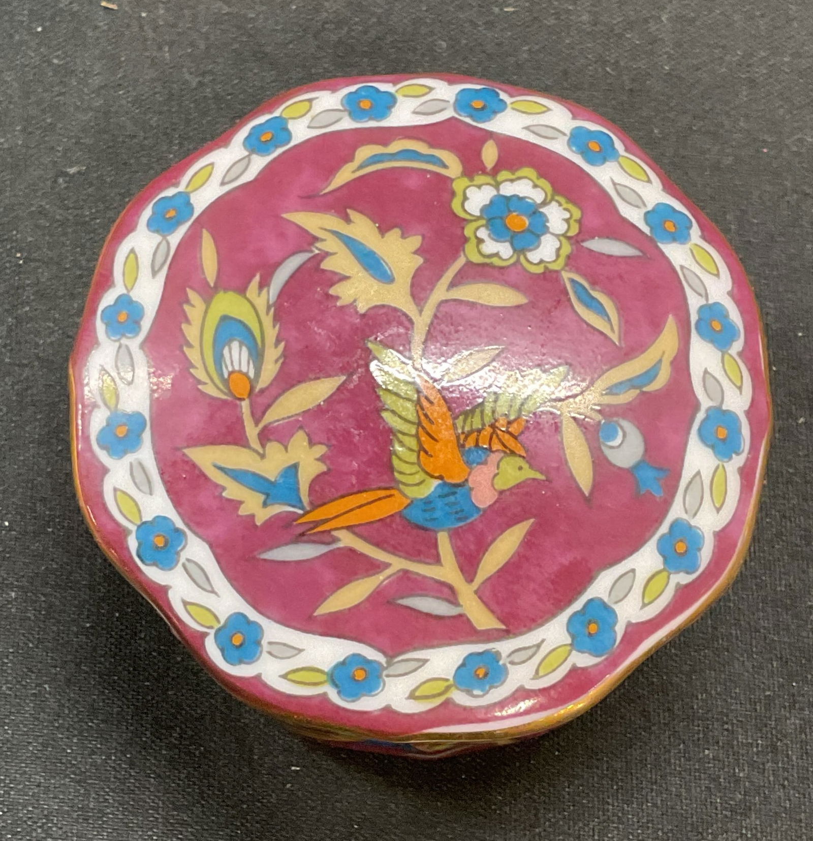 1983 TAKAHASHI Silk Road Porc Trinket Box USA: 1983 TAKAHASHI San Francisco Silk Road pattern porcelain trinket box. Hand painted red and blue with bird and floral design. Hallmarked and marked on sticker on underside, reads San Francisco. Measure