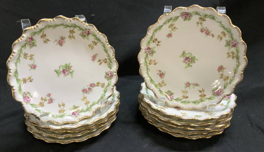 Lot 11+ LIMOGES Pink Roses Porcelain Plates FRANCE: Lot 11+ LIMOGES Pink Roses Porcelain Plates FRANCE Lot includes 11 porcelain plates featuring a hand-painted pink rose pattern & gold trim with a scalloped edge. Signed & marked on underside. Reads LI