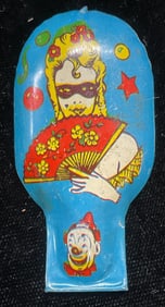 USA Toy Mfg Co Tin Litho Woman Clown Clicker