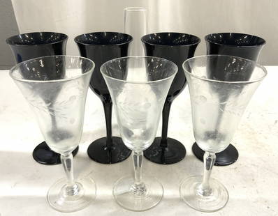 Lot 8 Assorted Cordial Glasses & Bud Vase: Lot includes 1 Bud vase, 4 navy blue toned cordials & 3 cordials with frosted vine and leaf detail. Bases of each stem have circular forms. Larger cordials measure approximately 5.15 inches tall 2.15