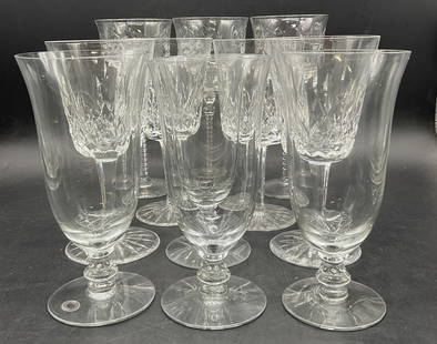 Lot 11 Crystal Stemware, Waterford Crystalware +: Eleven pieces of crystal stemware. Four cut crystal pieces are marked Waterford on the underside, some are worn. Measures approx. 7.75H x 3.25W in. The other pieces of crystal stemware feature flared