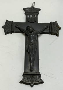 Vintage Religious Metal Crucifix: Vintage Religious Metal Crucifix Metal crucifix that has a religious figure of Jesus in the middle, including a distinctive pattern on the sides of the cross. Reverse marked 230. Surface wear consiste