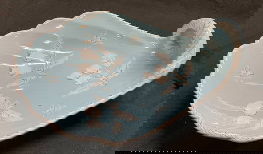 Vntg PV Hand Painted Shell Ceramic Dish ITALY: Vntg Hand Painted Shell Shaped Ceramic Dish ITALY Dish features a distinctive light blue glaze with hand- painted white fruit & leaf designs. Dish has a scalloped shell shape. Marked on underside. Rea
