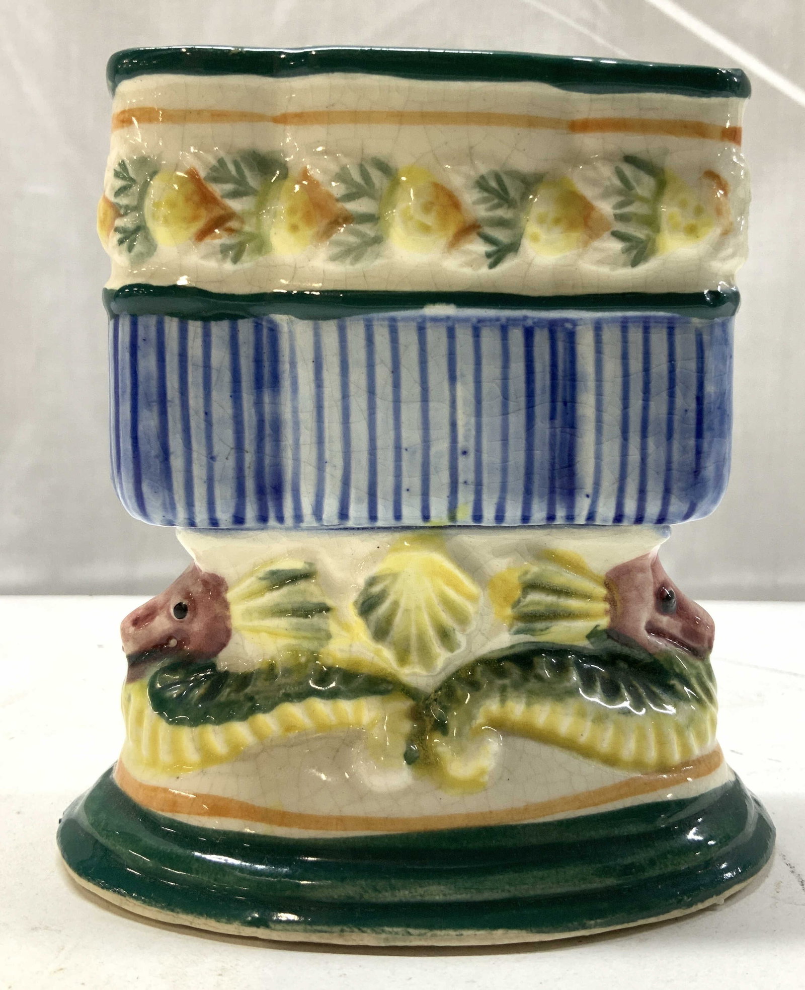 Maruhon Ware Ceramic Cigarette Holder Vessel JAPAN: Marked on underside Maruhon Ware Made in Japan. Maruhon Ware Ceramic Cigarette Holder JAPAN Cigarette holder featuring fish motifs on the bottom & a floral pattern on top. Holder is textured & has var