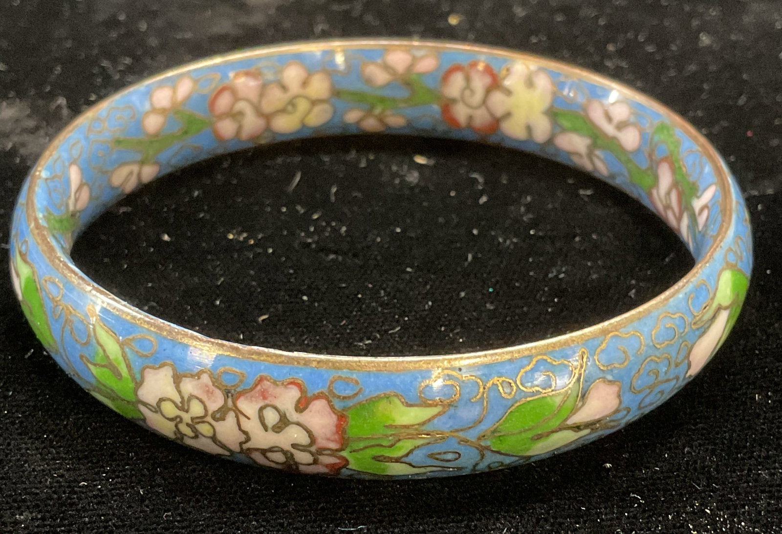 Vintage Blue Enamel Cloisonne Floral Bangle: Vintage cloisonne enameled brass bangle in blue with floral motif. Measures approx 2.5 inches wide. Some wear including scratching observed. Jewelry, estate jewelry, costume jewelry, cocktail jewelry,