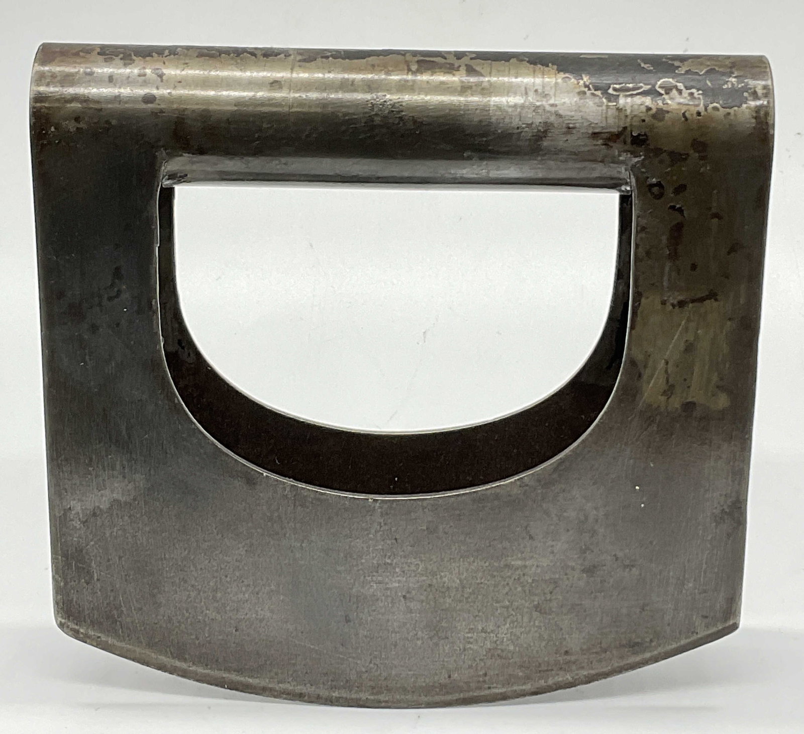 Vintage Metal Food Chopper: Vintage Metal Food Chopper. Crafted from a silver hued metal. Curved base. Measures approx. 5.25W x 5.25H in. Losses to finish, discoloration, and surface wear present. home decor, home accents, homew