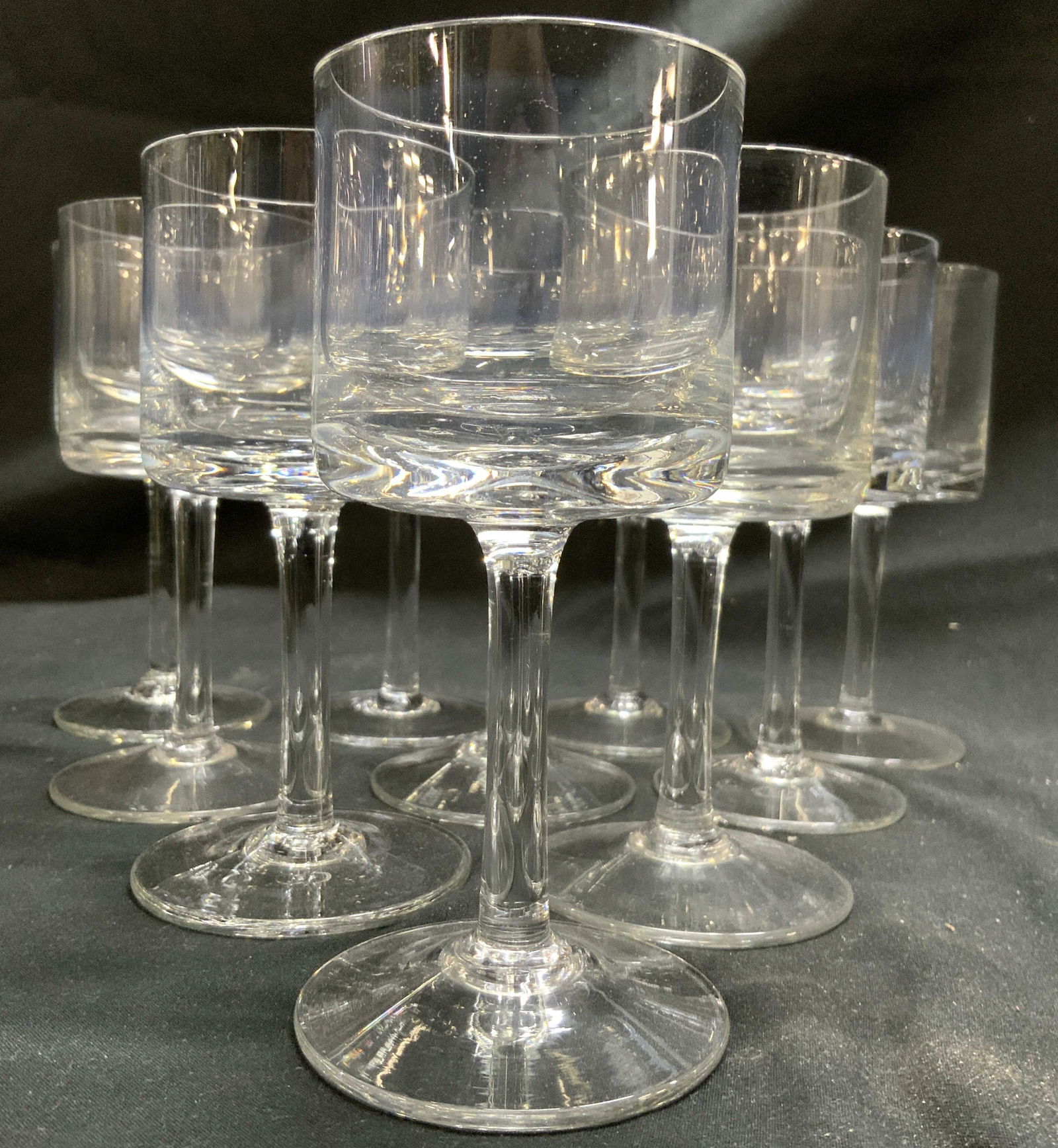 CALVIN KLEIN Set 10 Bergen Crystal Water Goblets: Water goblets appear to be CALVIN KLEIN BERGEN. Each goblet appears to be crystal. Basins each have Cylindrical forms. Each base has circular form. Goblets each measure approximately 5.5 inches tall 2
