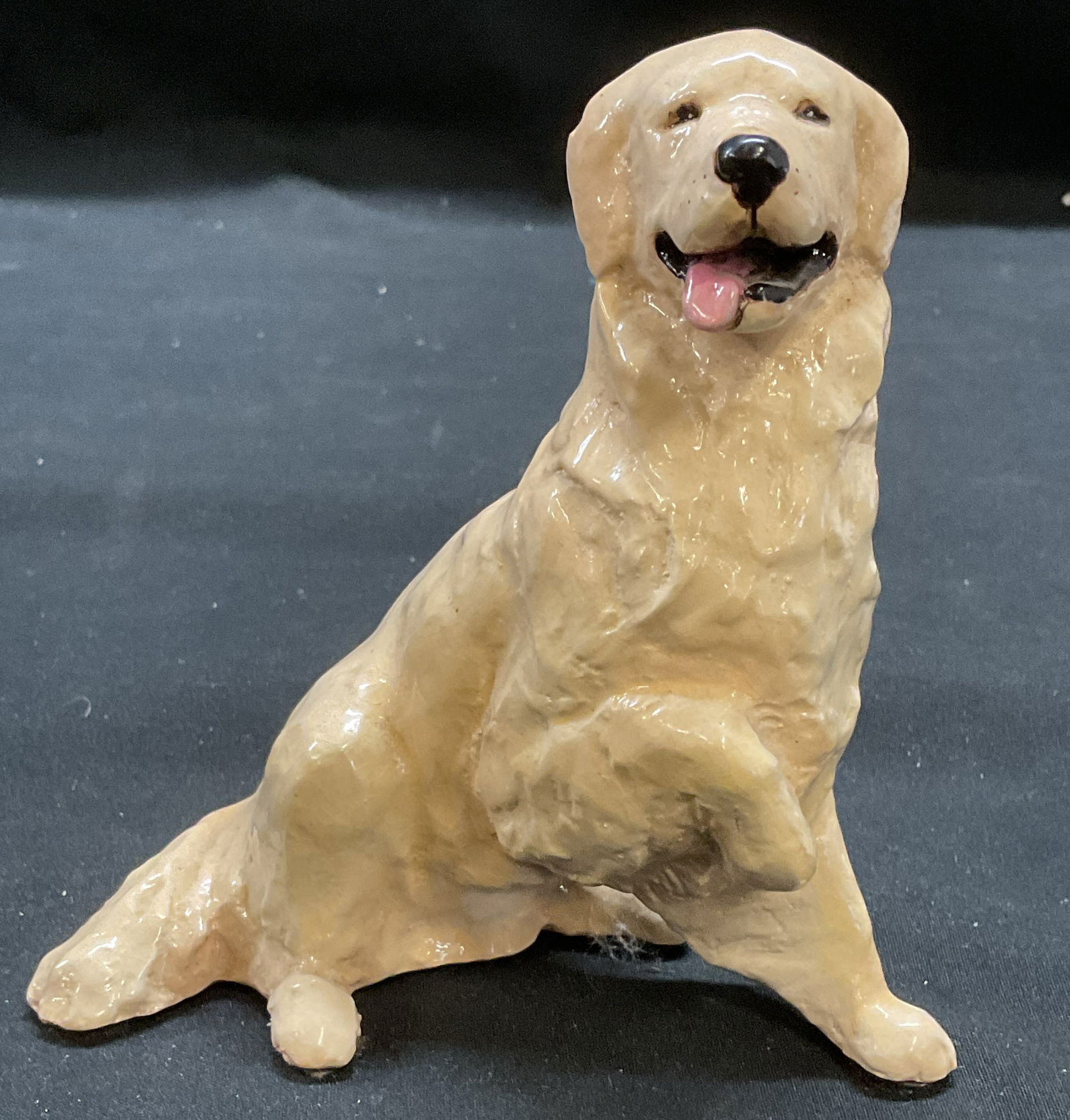 Signed Ron Hevener Ltd Edt Dog Figurine: Signed Ron Hevener dog figurine. Edition number 205/1000. Hand painted cast material. Possibly ceramic. Piece has weight. Measures approx 4.25 x 2.5 x 4.75 inches. Some scratching. Ron Hevener, Ron He