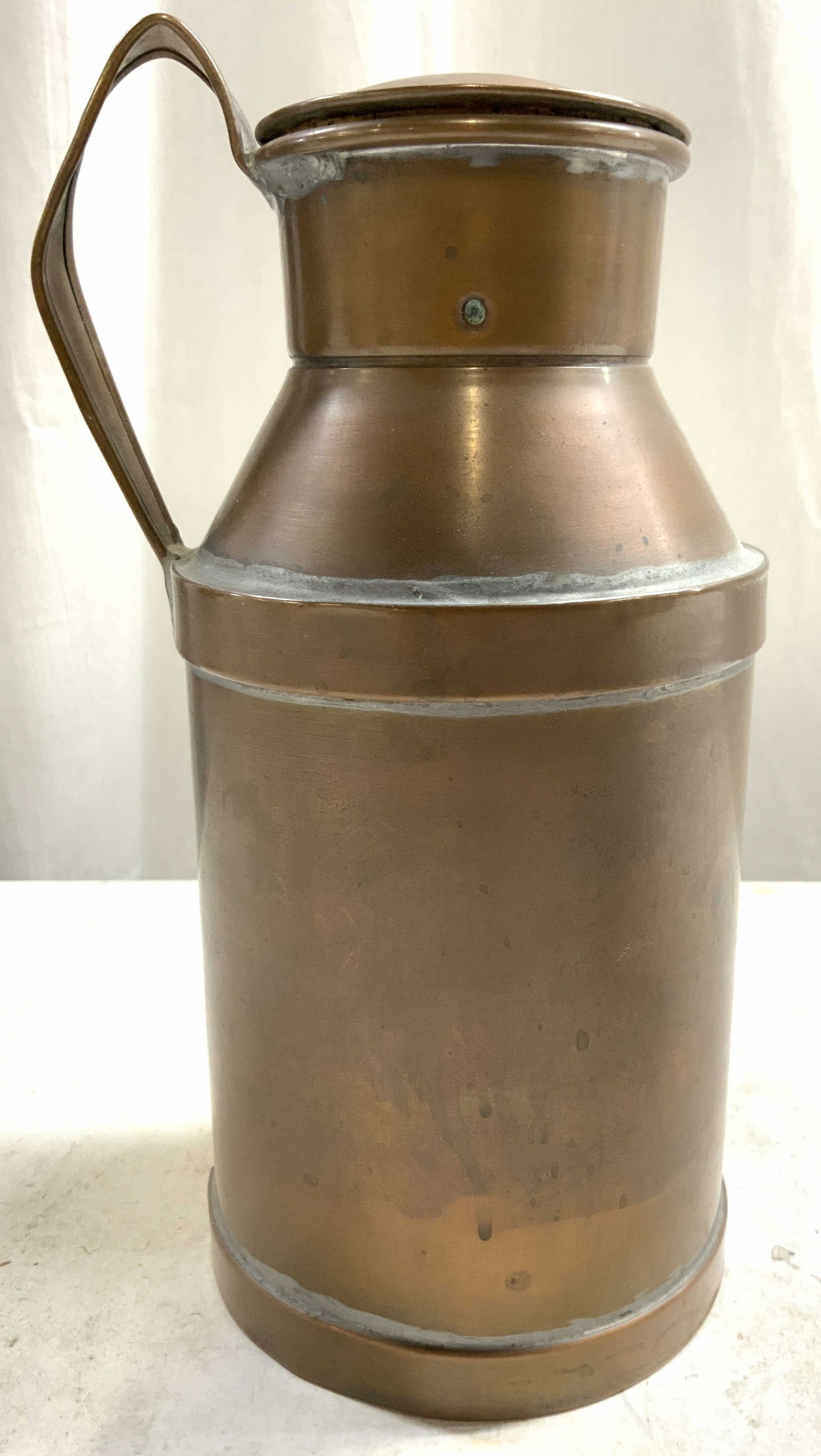 HE WRIGHT CO Antq Copper Milk Can W Lid USA: Underside is inscribed H E WRIGHT COMPANY BOSTON MASS (Massachusetts) . Milk can appears to be antique possibly vintage. Piece includes lid. Milk can is copper. Milk can also has handle. Vessel measur