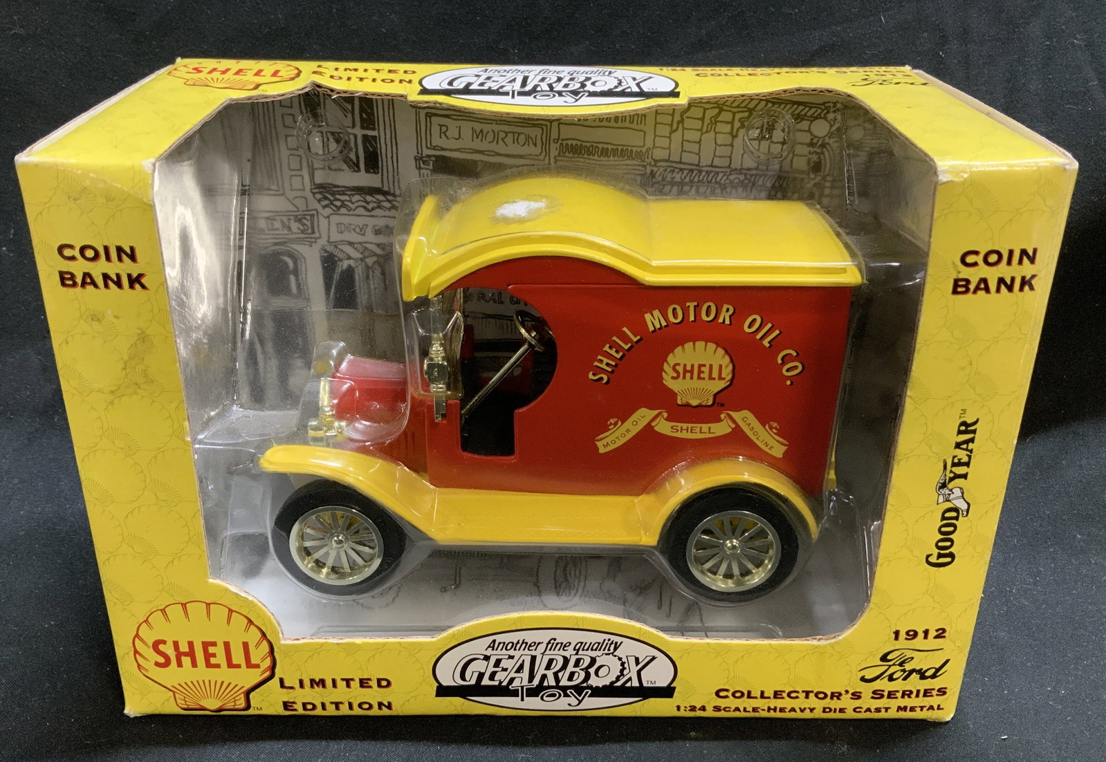 Gearbox Collectors Series 1912 Ford Coin Bank NIP: Gearbox Collectors Series 1912 Ford Coin Bank NIP 1:24 scale-heavy die cast metal. Replica of a 1912 Ford Delivery Car, featuring Shell Motor Oil Co & Good Year Branding. Part of the collectors series