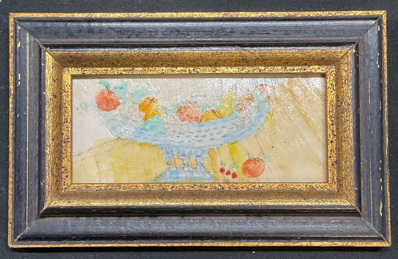 Famed Still Life Fruit Bowl Painting: Framed painting on paper. Still life with bowl of fruit in blue. Black and gilt wood frame. Not examined out of frame. Frame measures approx 3.25 x 5.25 inches. Art, fine art, framed art, home decor, 