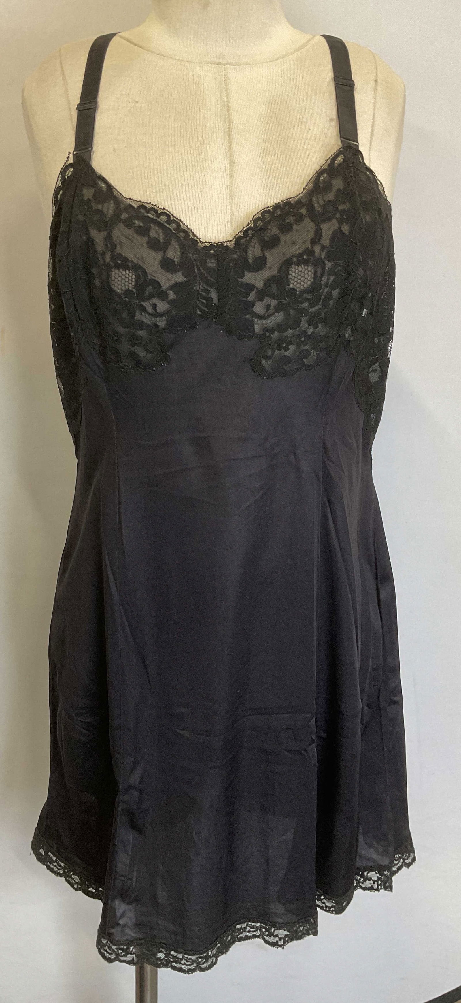 Vintage Black Lace Trim Slip Dress: Vintage black slip dress with lace trim. Size 40. Synthetic material. Some wear consistent with exposure. Vintage slip, black slip, slip dress, lace slip, vintage fashion, intimates, sleepwear, lounge