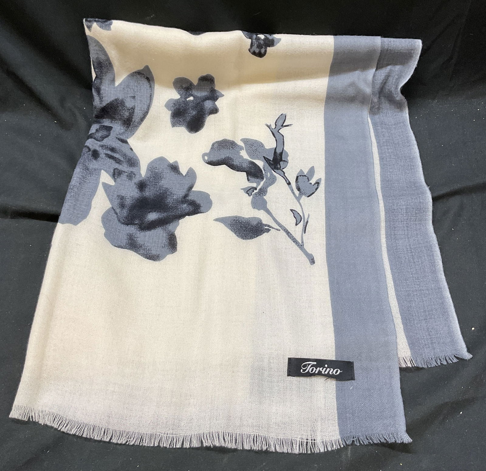 Vtg Torino Cream & Grey Floral Print Wool Scarf: Vintage Torino cream and grey floral print wool scarf. Floral print pattern on cream background design. 100% wool scarf wrap with fringed edges. Measures 17 x 28 inches. Some surface wear consistent w