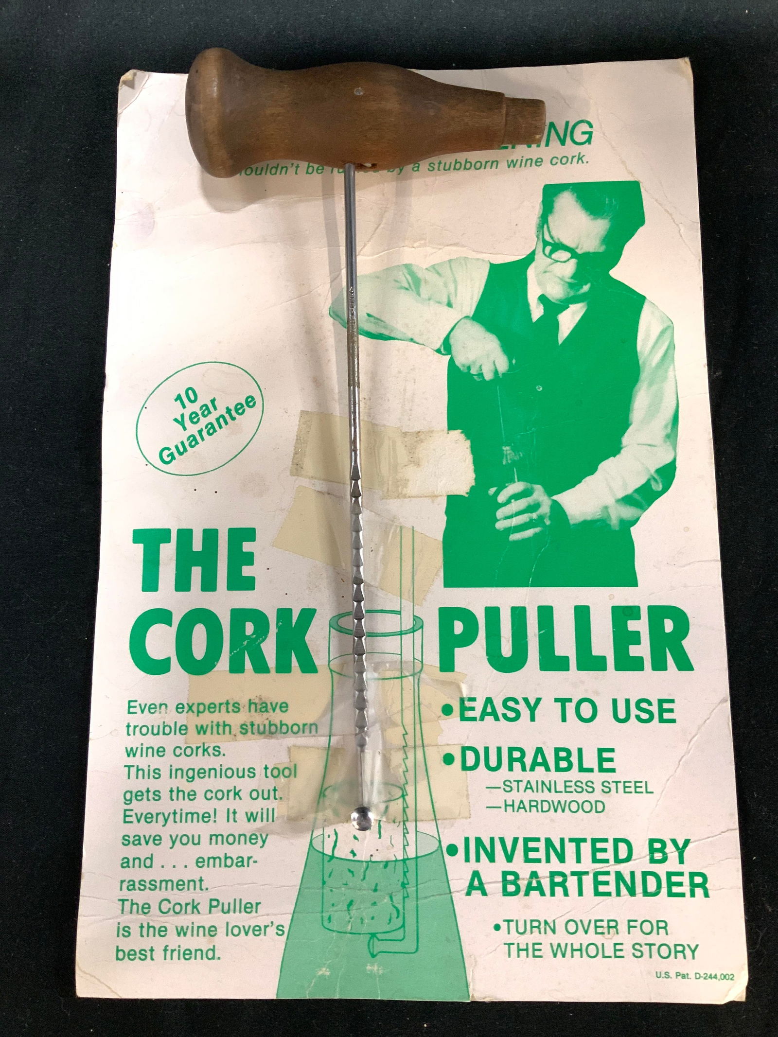 Vntg Stainless & Hardwood The Cork Puller Tool: Designed by Bernie Bonin, Bartender ? The Griswold Inn, Essex CT. Essec Connecticut Enterprises Inc. Packaging reads, The Cork Puller, a tool designed to easily remove stubborn wine corks. Cork is sta