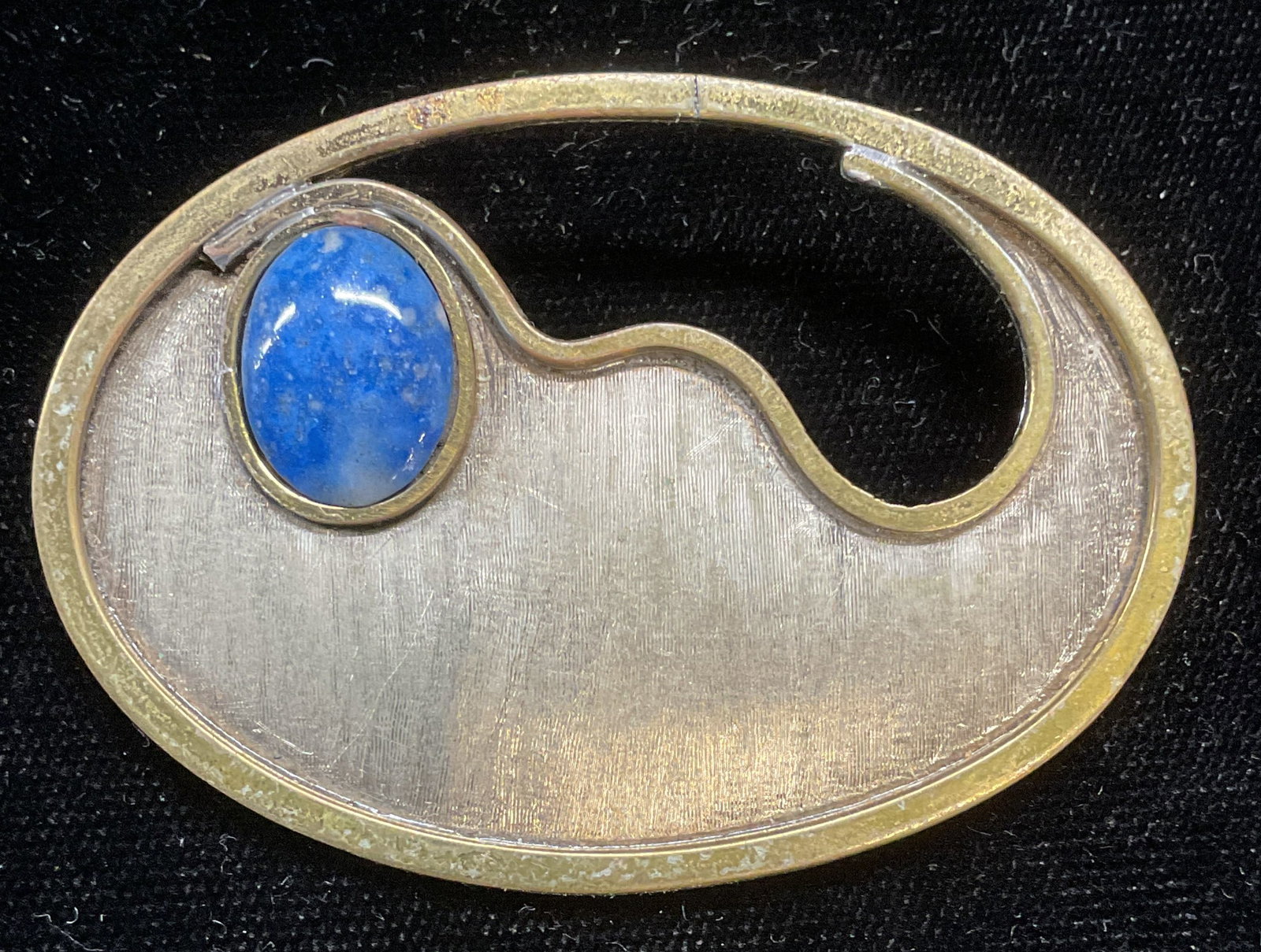 Vintage Silver Tone Blue Cabochon Brooch: Vintage silver tone modernist style brooch with blue lucite cabochon. Measures approx 1.5 x 2.25 inches. Some scratching observed. Jewelry, estate jewelry, costume jewelry, fashion jewelry, accessorie