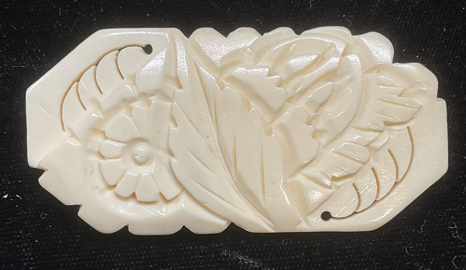 Vintage Carved White Lucite Flower Brooch: Vintage carved white lucite bone style flower motif brooch. Measures approx 1.25 x 2.75 inches. Some wear including scratching. Jewelry, estate jewelry, costume jewelry, cocktail jewelry, fashion jewe