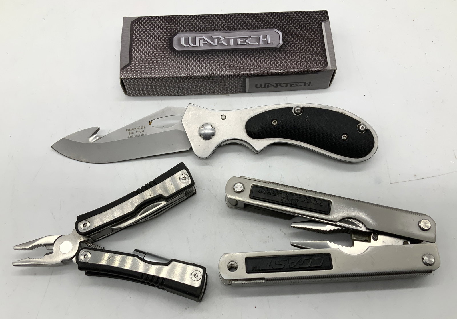 Lot 3 Stainless Steel Pliers & Pocket Knife COAST: Lot includes, 2 Pocket Pliers & 1 pocket knife. Pieces are stainless steel & vary in brand. Brands including, WARTECH & COAST. Surface wear consistent to age, use & exposure. Measurements: length 7.7i