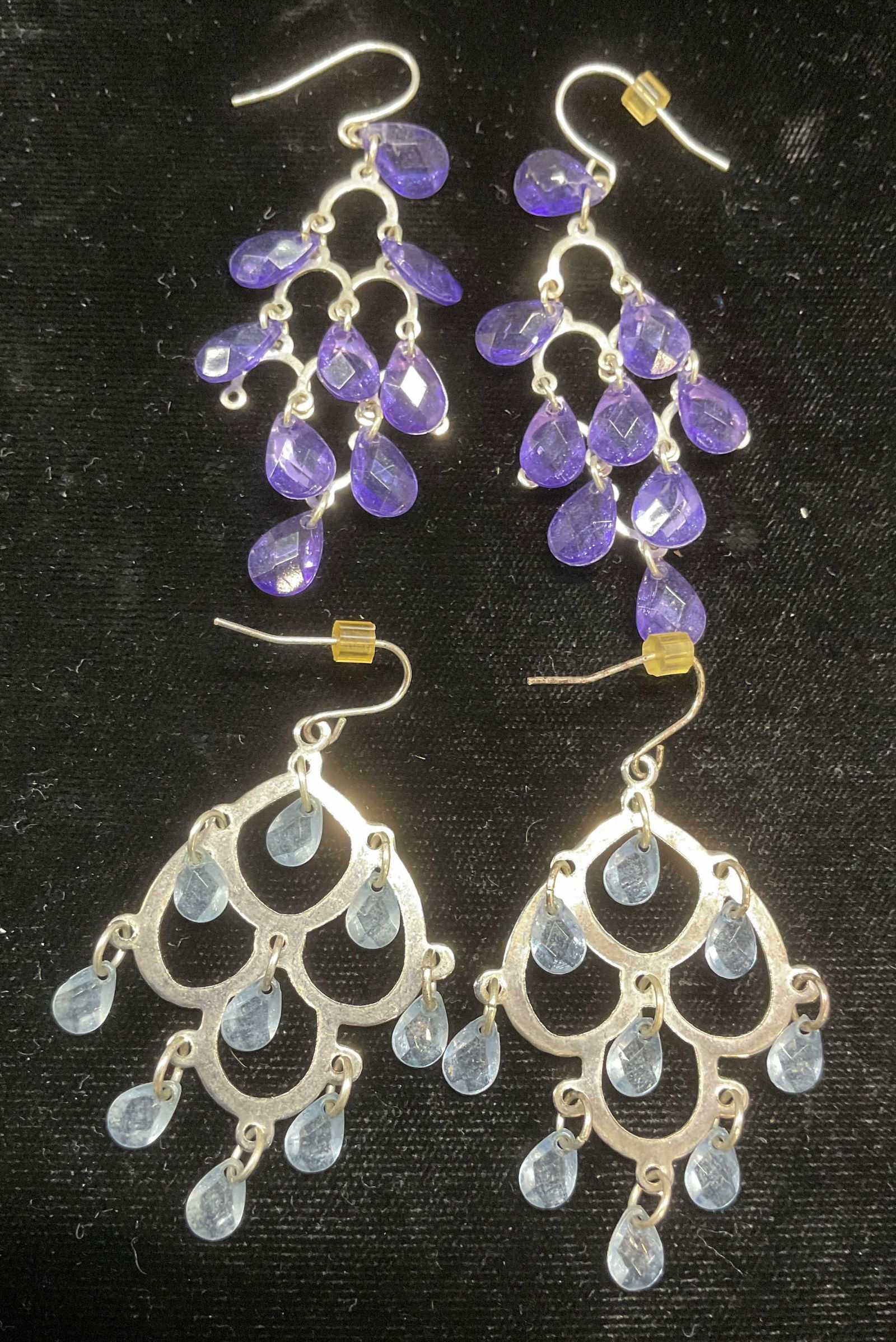 Lot 2 Vintage Crystal Chandelier Earrings: Lot of 2 pairs of vintage silver tone crystal chandelier earrings. Purple and blue crystals. Larger pair measure approx 2.25 inches long. Some wear including scratching observed. Jewelry, estate jewel